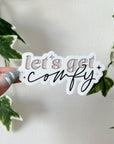 Let's Get Comfy Sticker - Deluxe Sticker